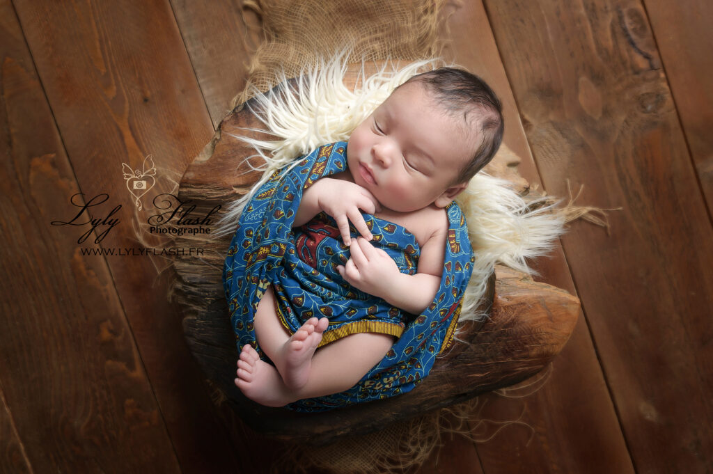 une belle photographie professionnelle réalisée par lyly flash pour la naissance du bébé le plus beau de France